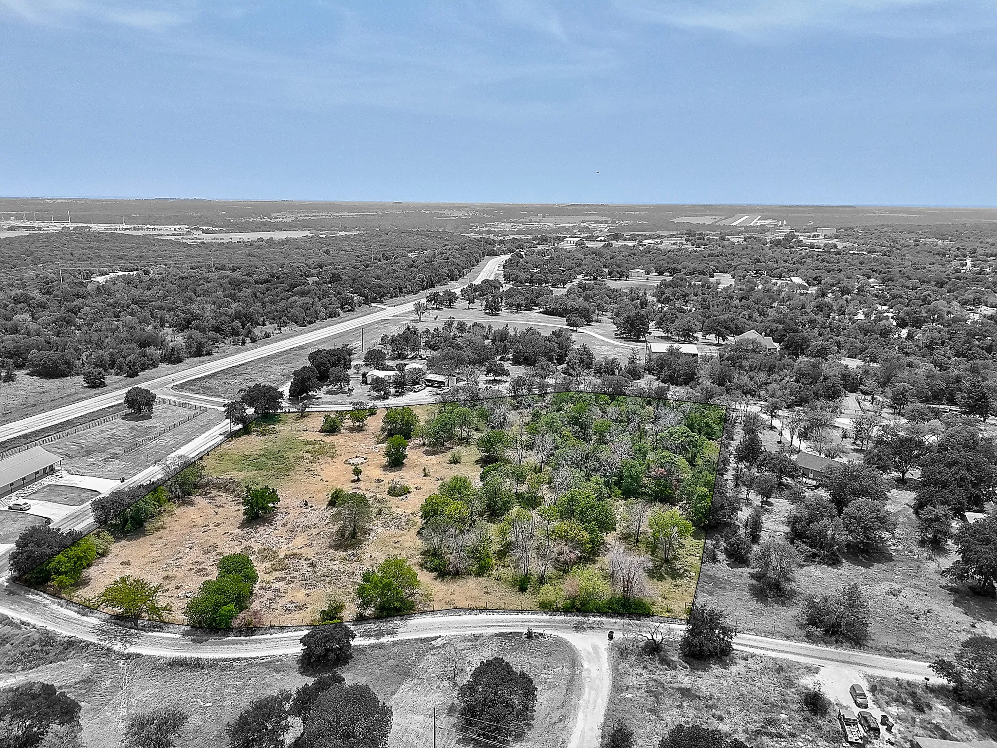 Drone / aerial view of a heavily wooded area
