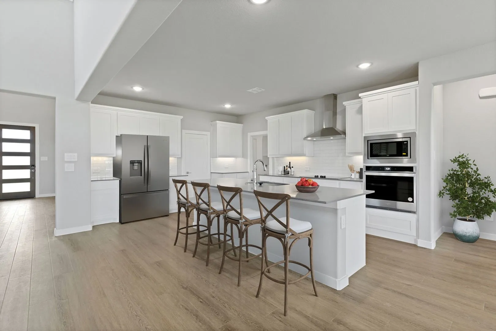 Kitchen in the Henley home plan by Trophy Signature Homes – REPRESENTATIVE PHOTO