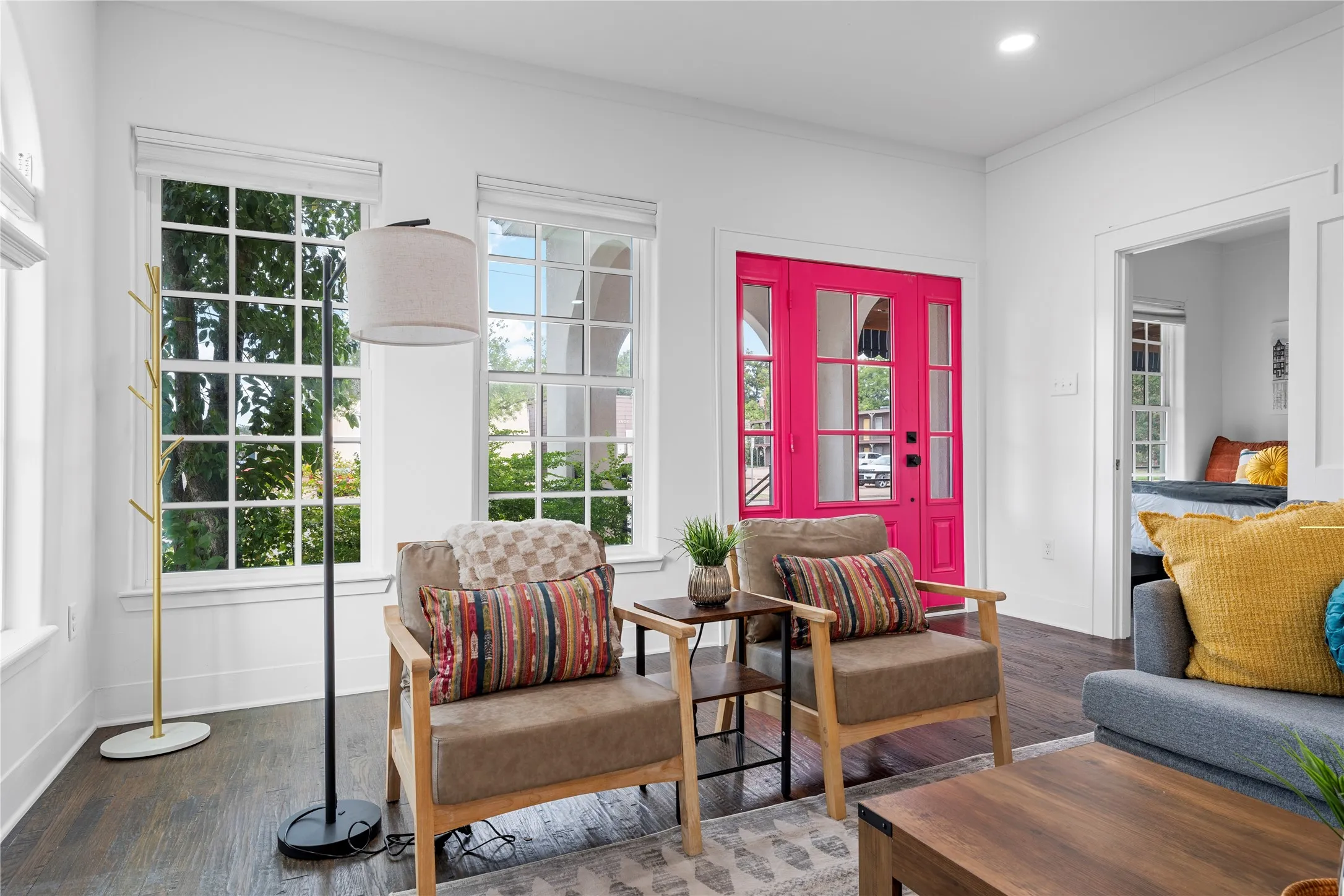Sitting room featuring hardwood / wood-style floors, ornamental molding, and recessed lighting