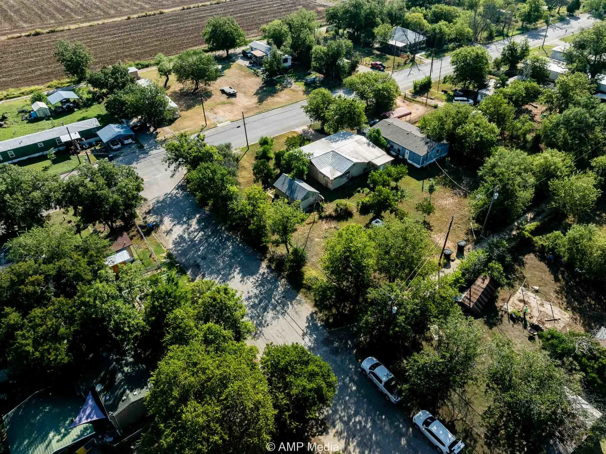 Aerial overview of property's location with extensive farmland and rural landscape