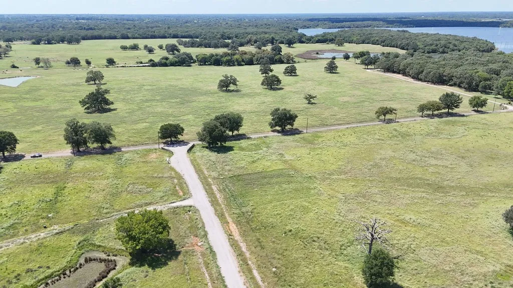 Overview of rural landscape with a nearby body of water