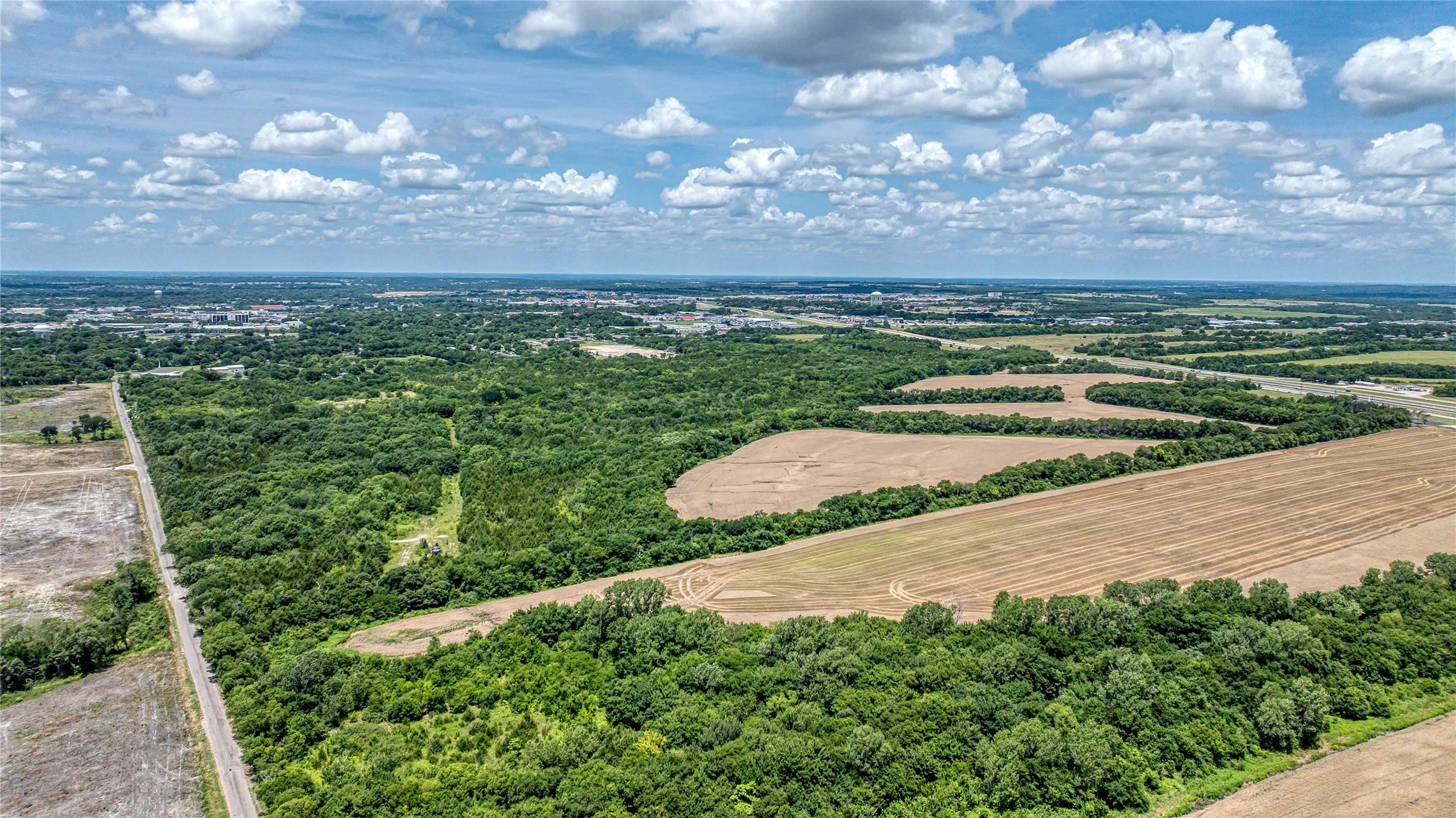 View of rural area with rows of crops