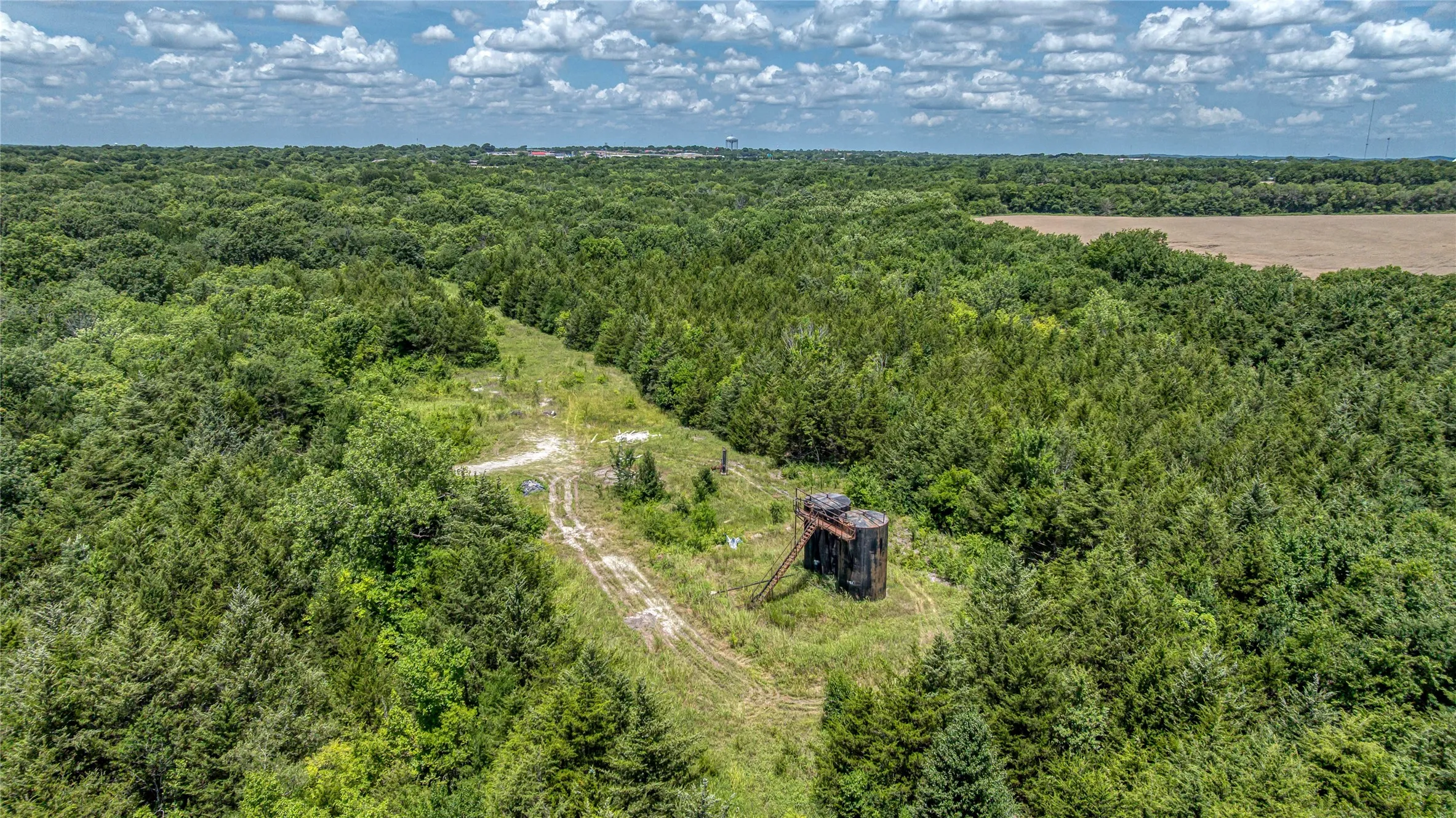 Aerial view of a heavily wooded area
