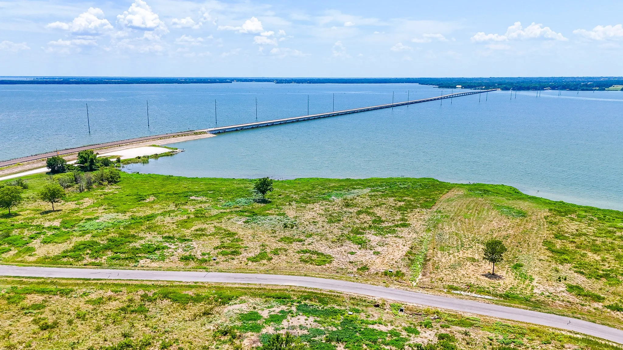 Bird's eye view of a notable bridge and a nearby body of water