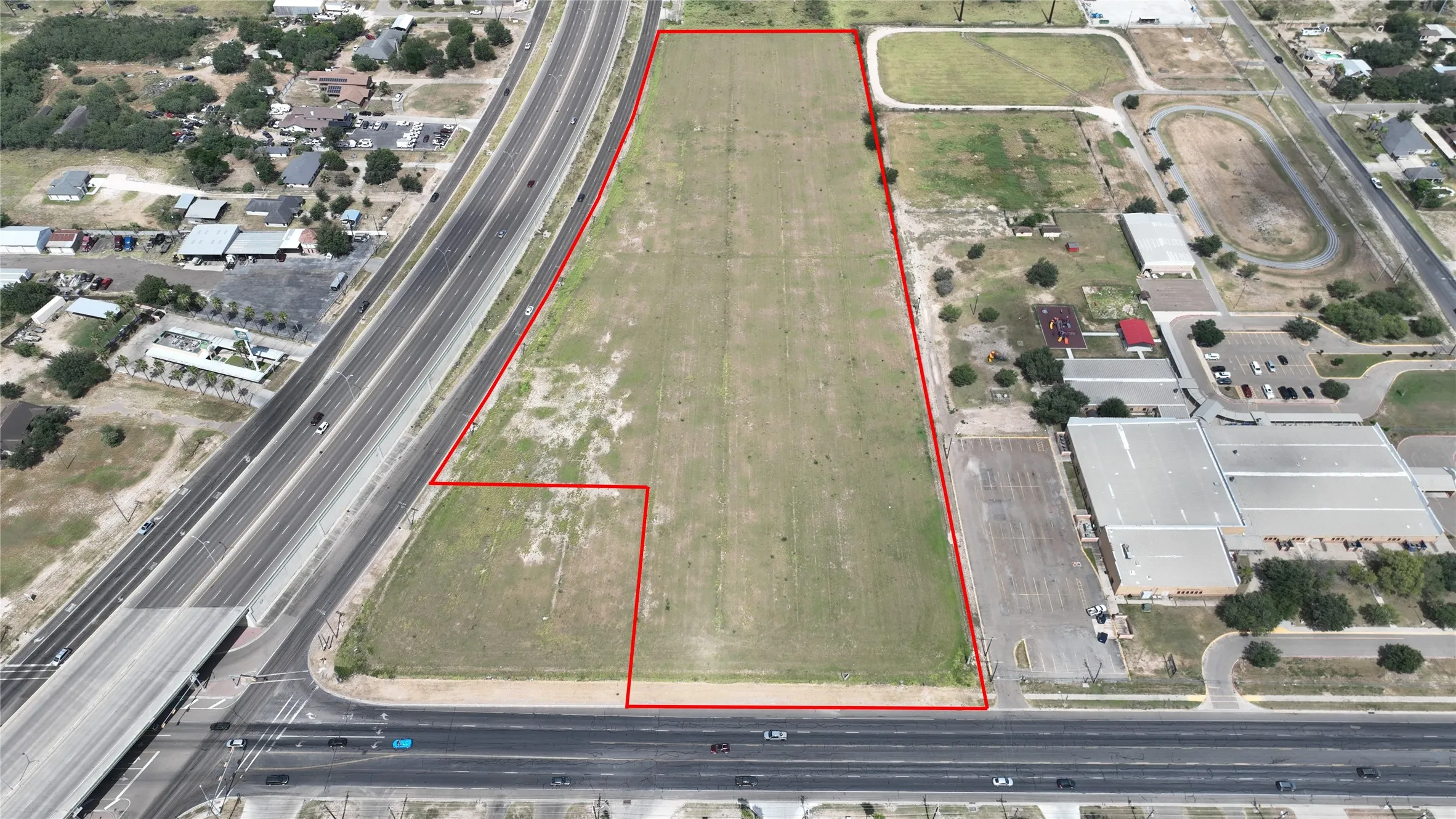 Aerial view of property's location featuring property parcel outlined