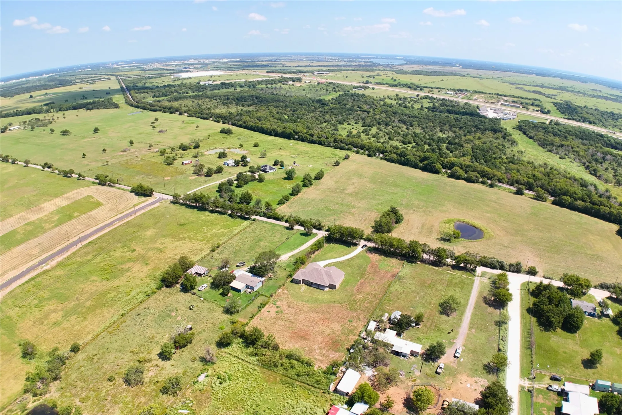 Aerial view of property's location featuring rural landscape