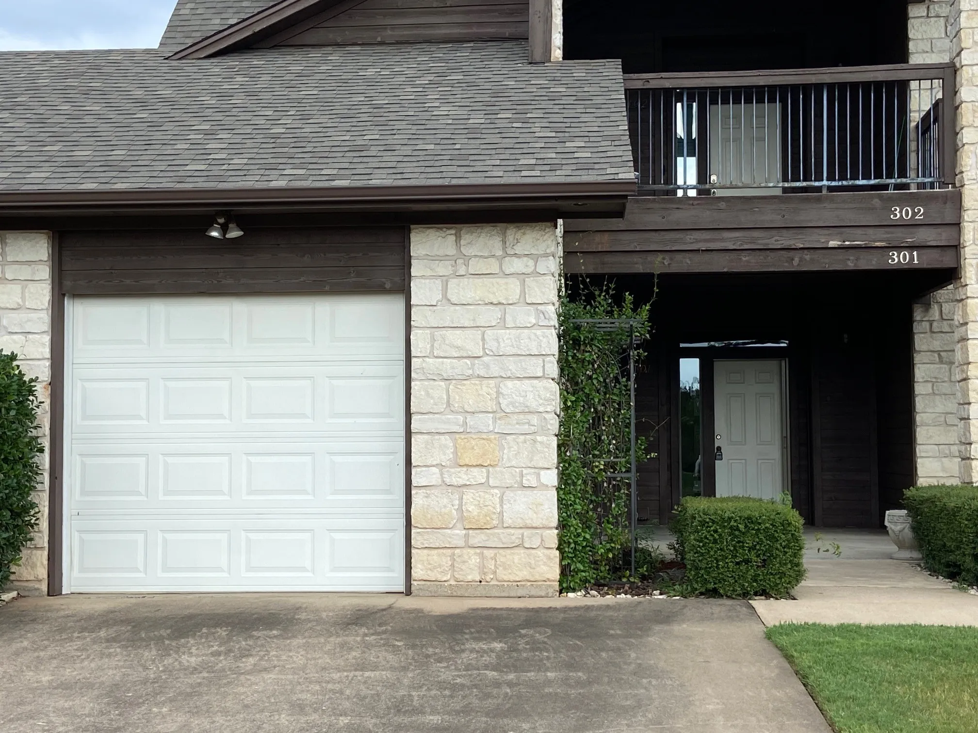 Downstairs condo with attached 1-car garage.
