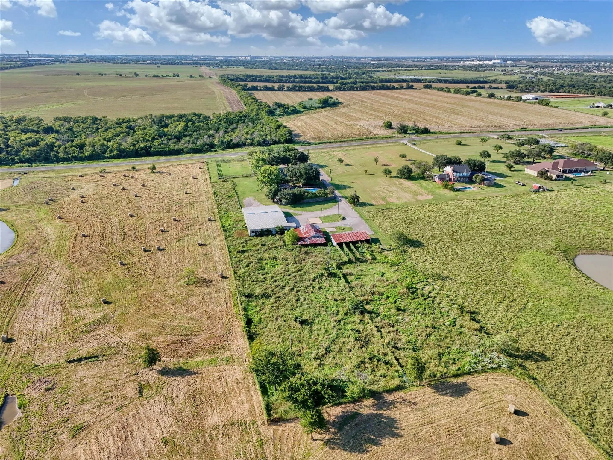 Aerial overview of property's location with rural landscape