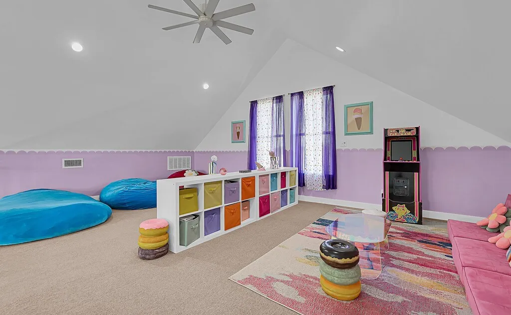 Playroom featuring vaulted ceiling, carpet floors, ceiling fan, and recessed lighting