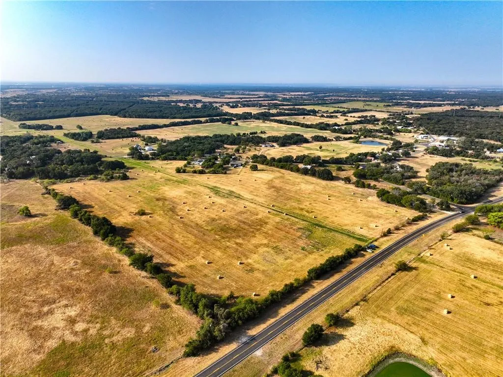 Aerial view of property's location featuring rural landscape