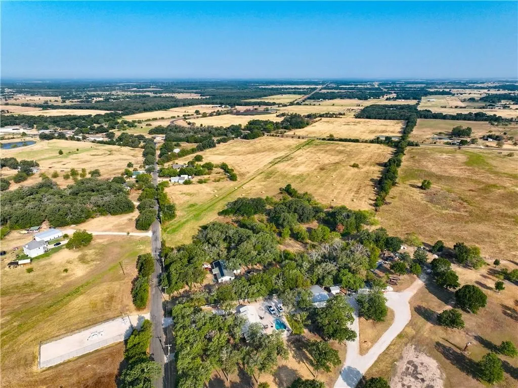 Aerial view of property's location with rural landscape