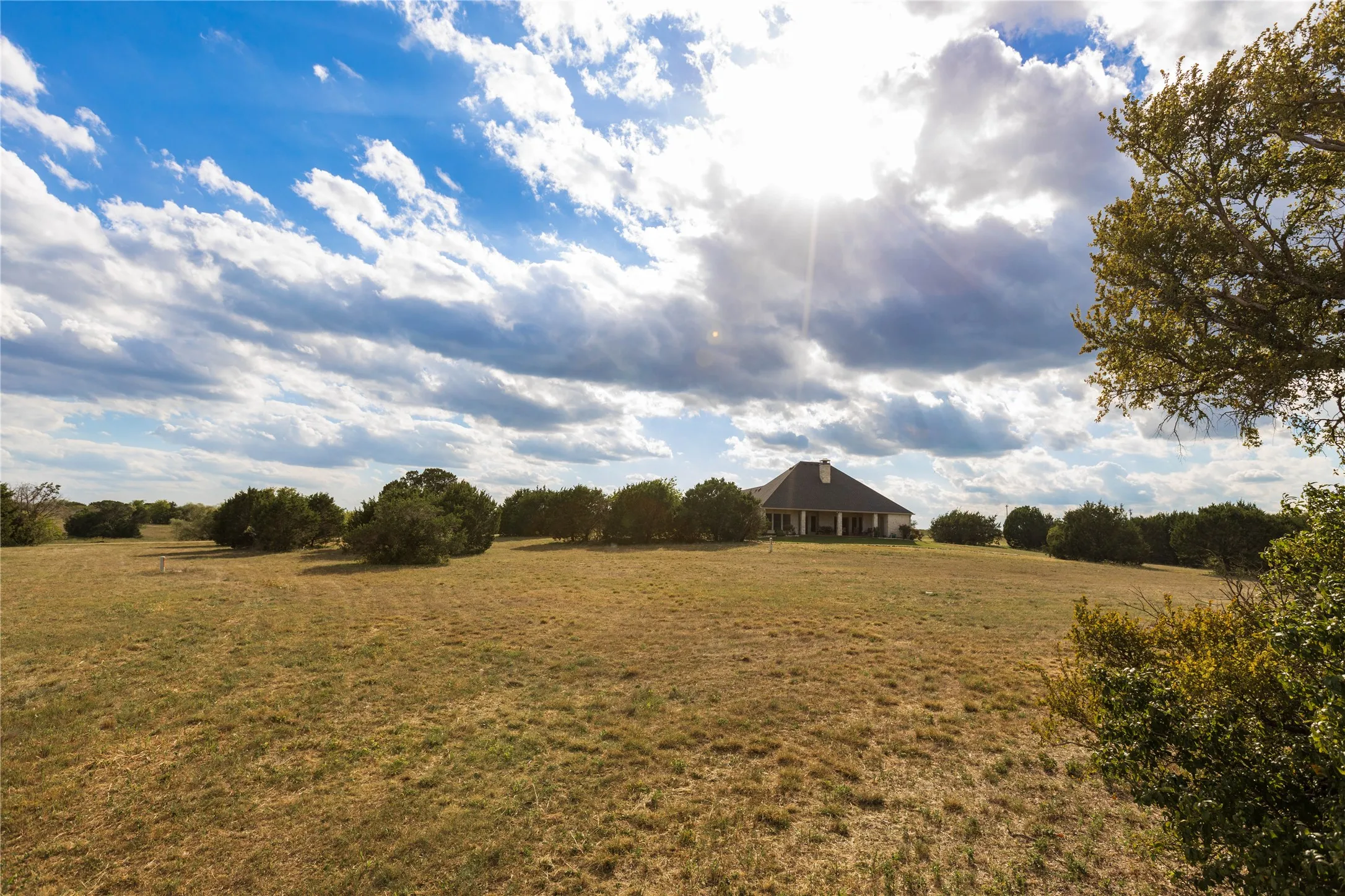 View of green lawn featuring a view of rural / pastoral area