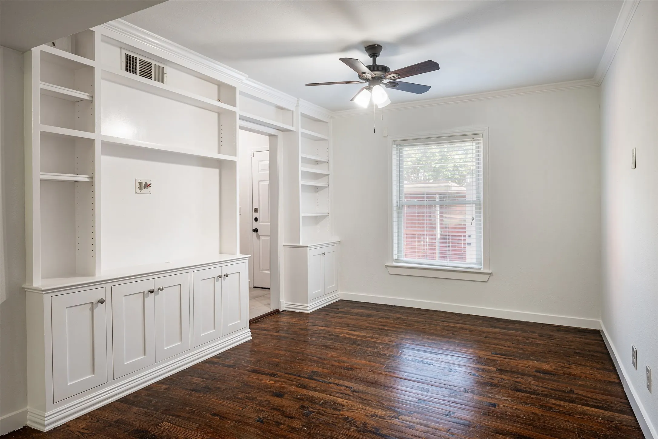 Dining area with built in shelving and window for more light