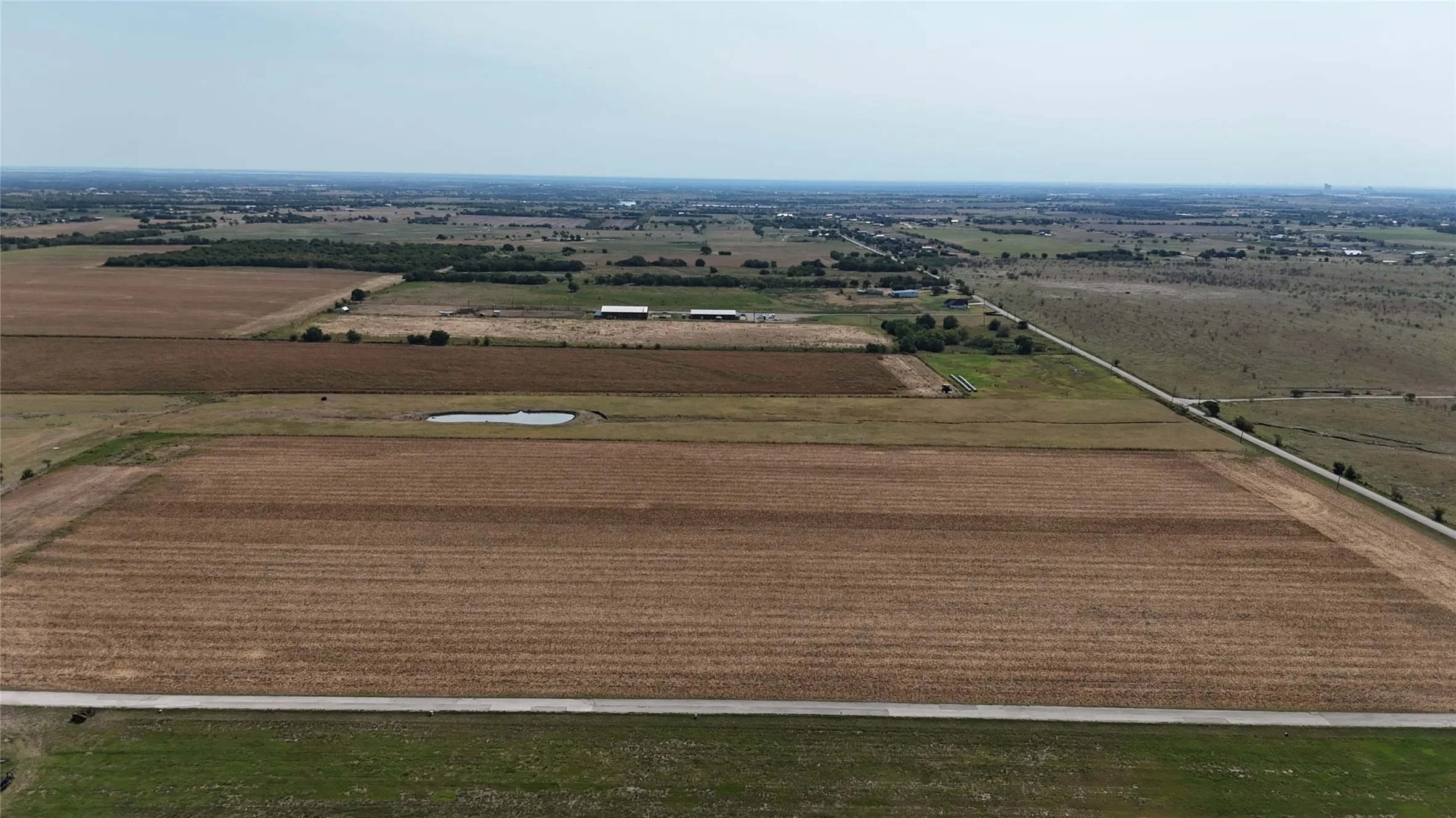 Overview of rural landscape featuring farmland