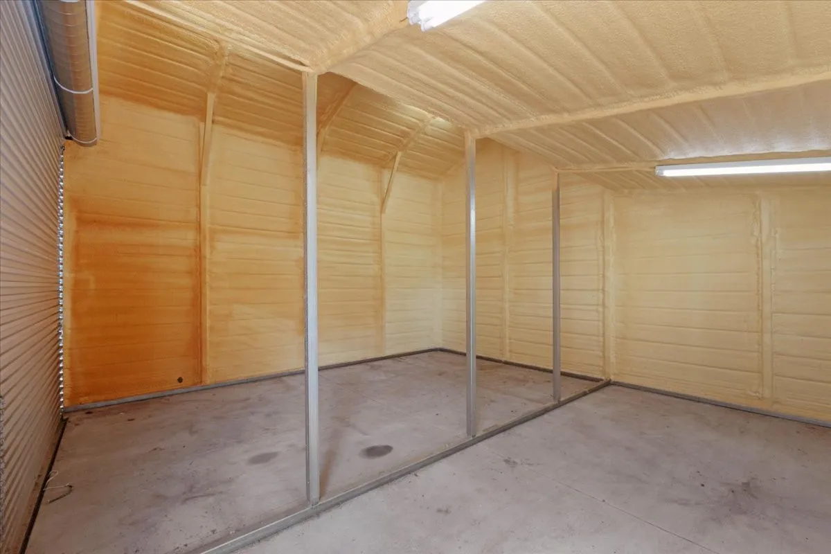 Interior of 23X20 workshop; electric; 10' roll up door; 1 exterior door