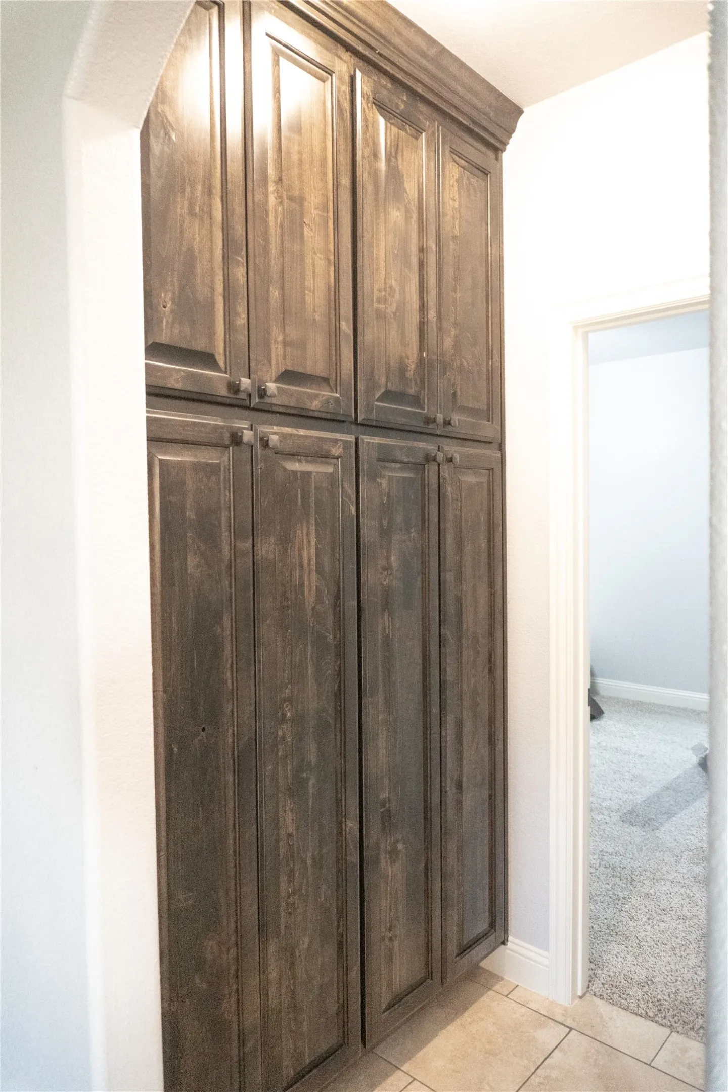 Linen Cabinet, next to Primary Bedroom
