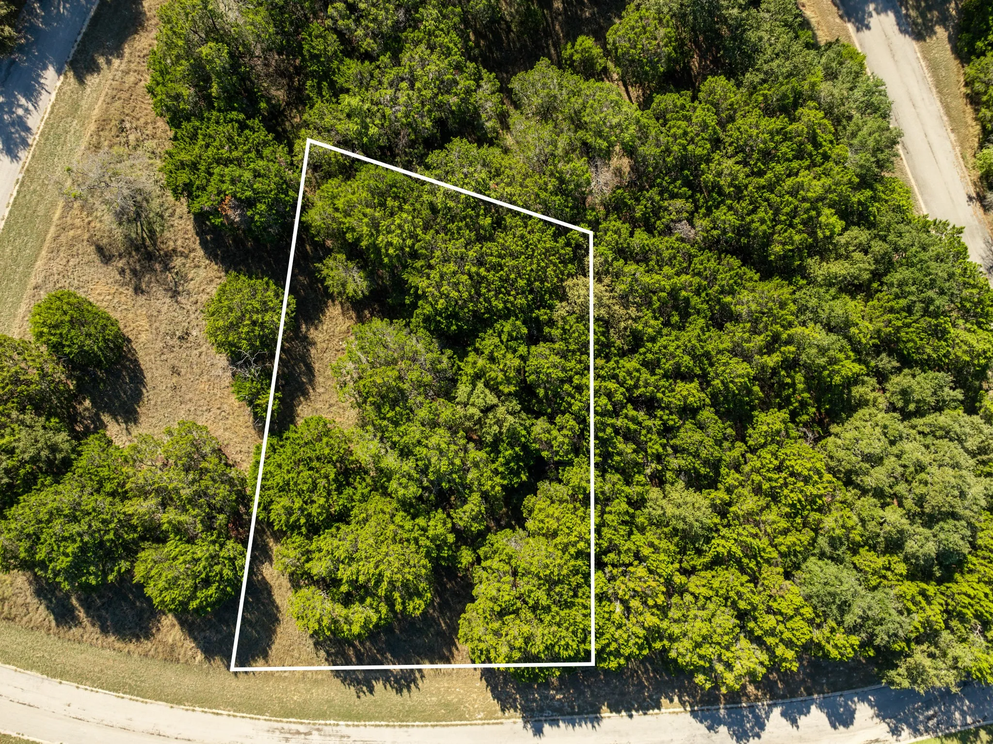 Aerial overview of property's location featuring property boundaries highlighted
