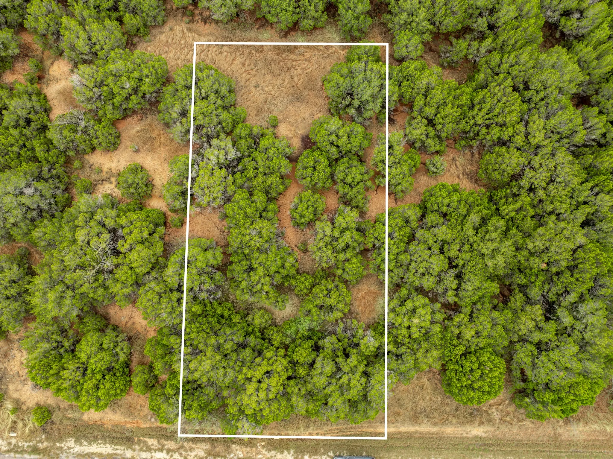 Aerial view of property's location with property parcel outlined
