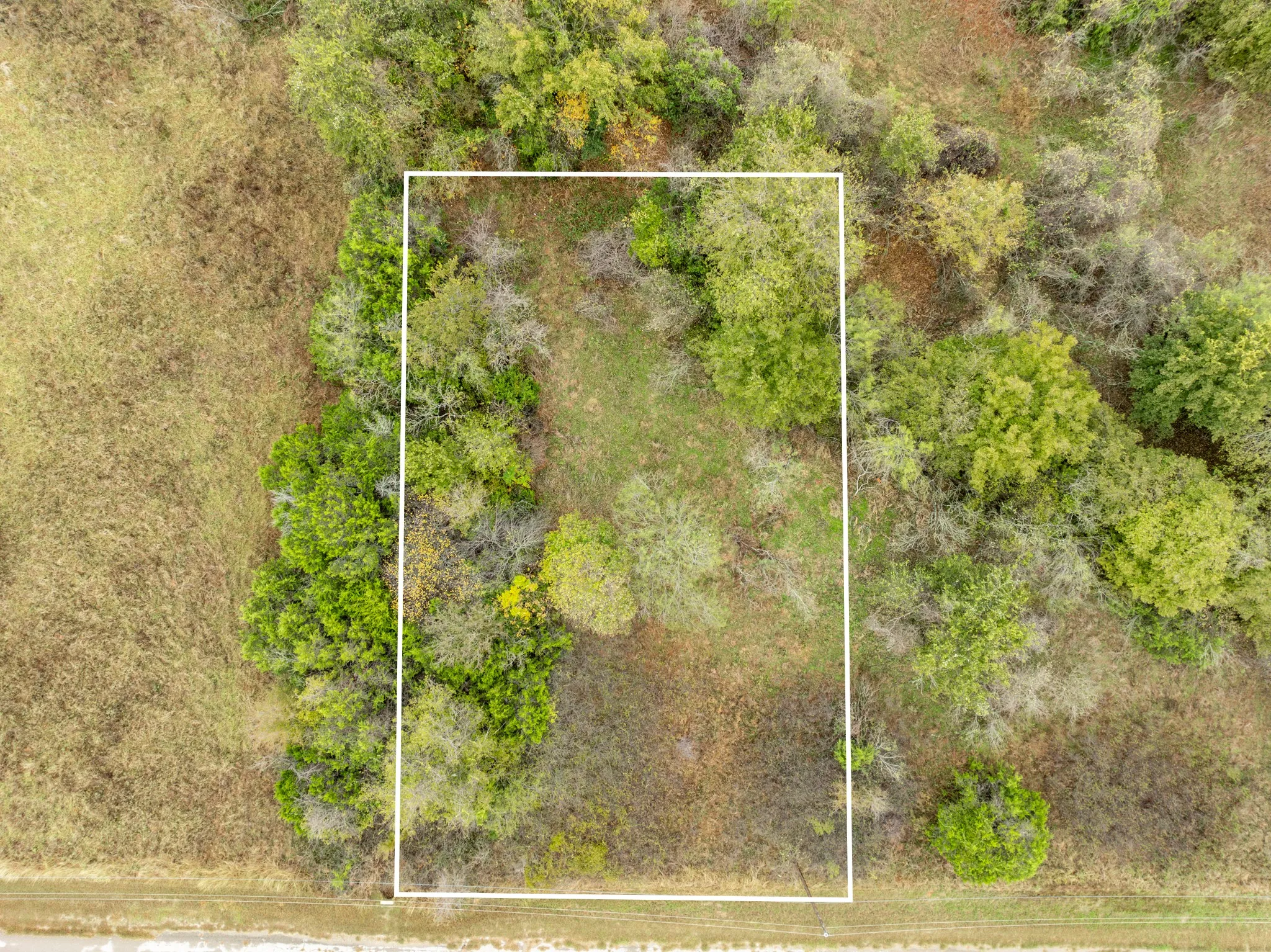 Aerial overview of property's location with property boundaries highlighted