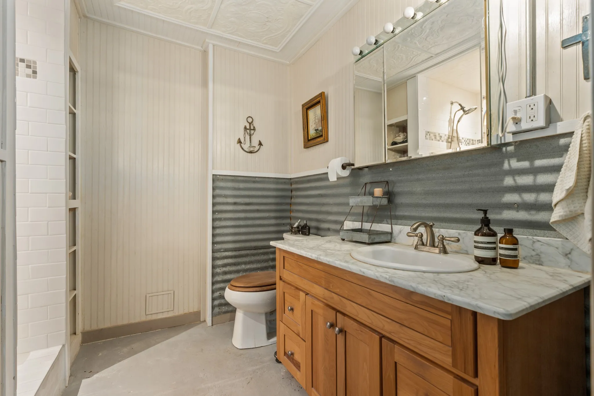 Full bathroom with vanity and an ornate ceiling