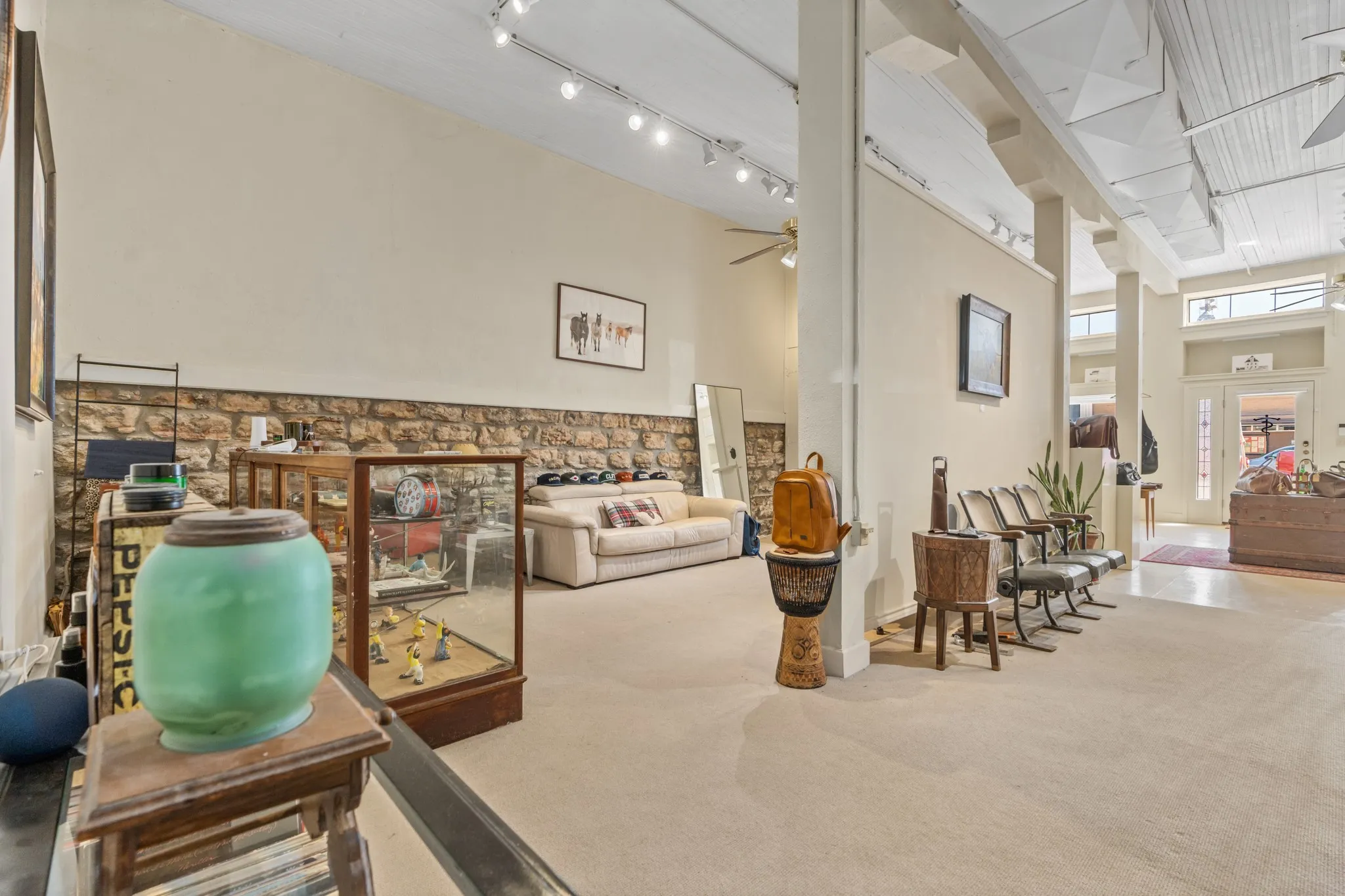 Common area with a high ceiling