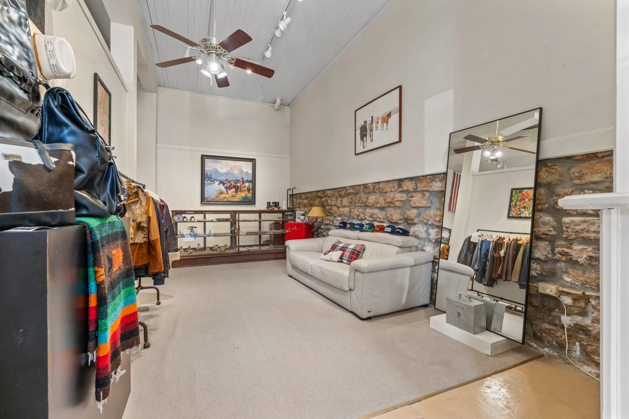 Living area featuring ceiling fan