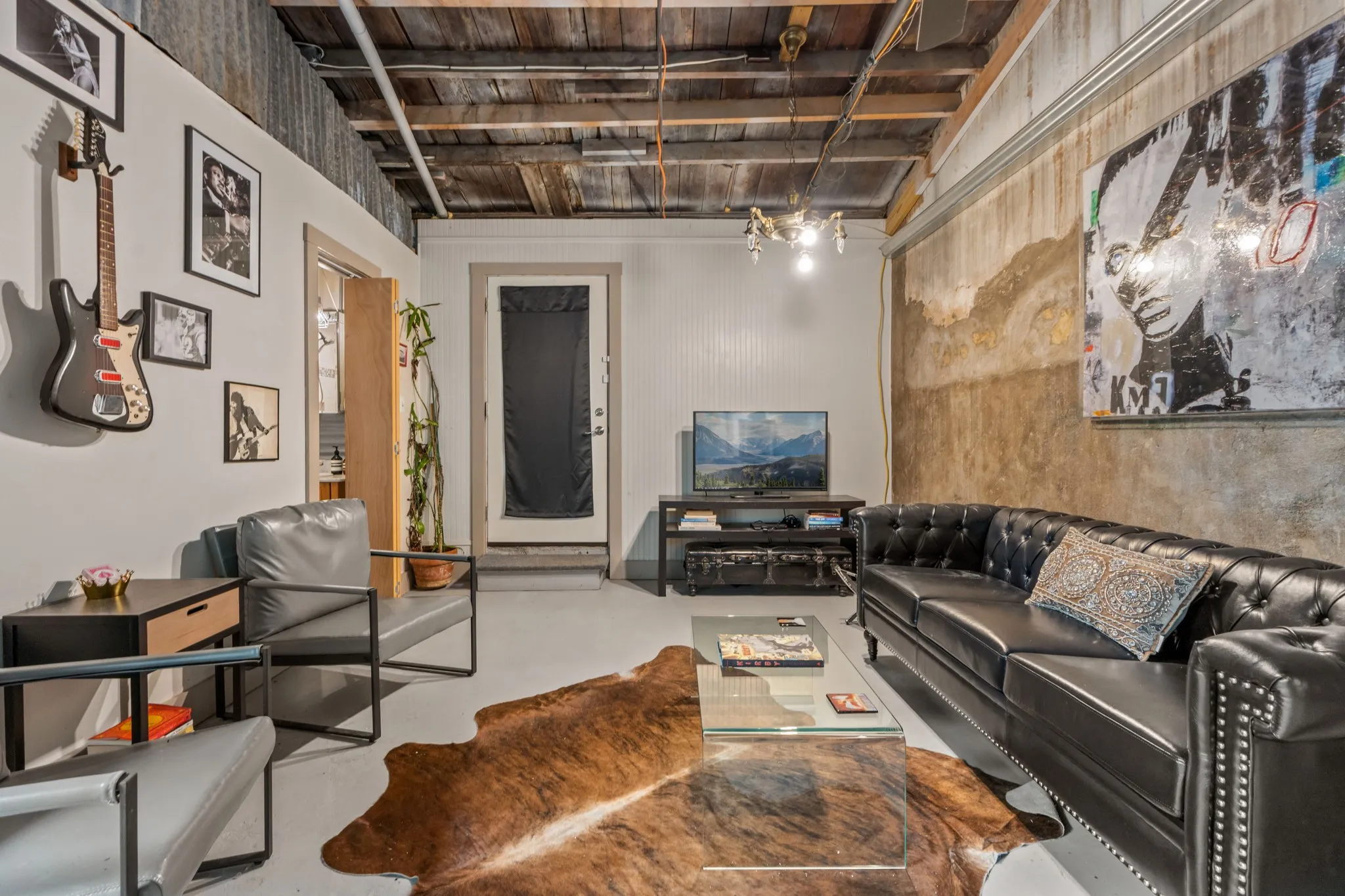 Living area featuring finished concrete floors