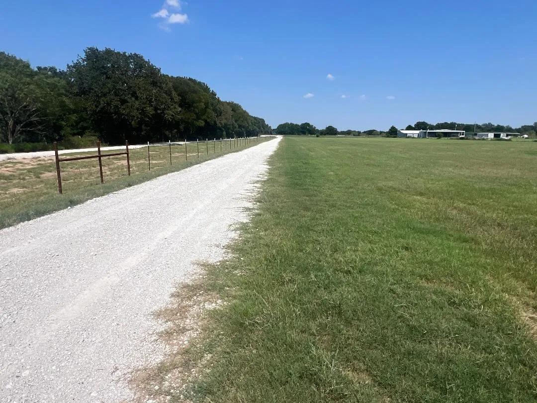 View of  gravel road featuring a rural view