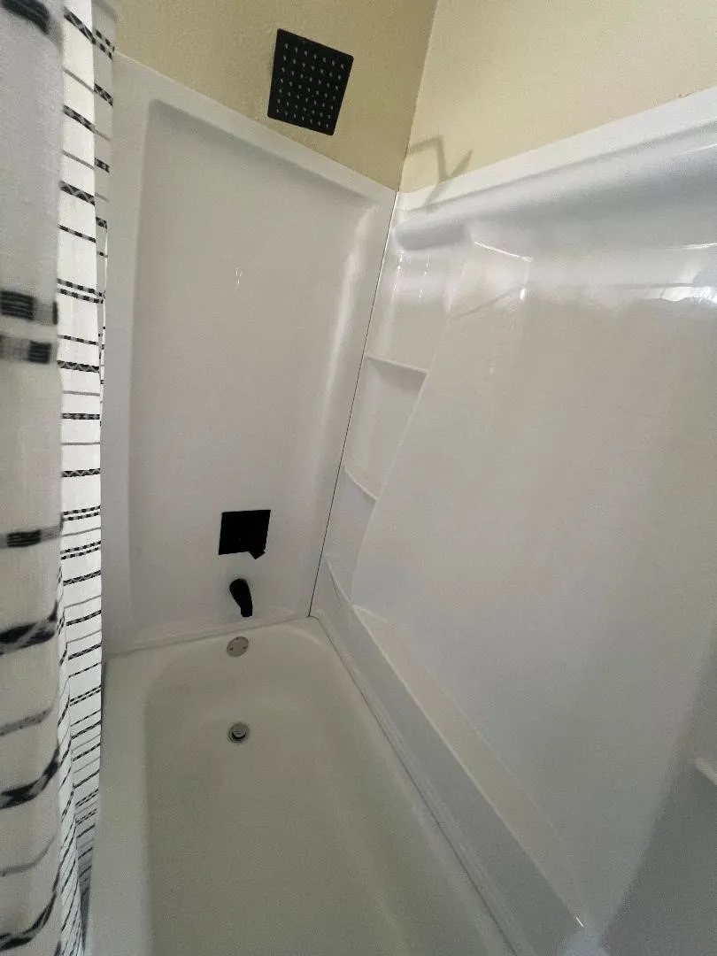 Bathroom with shower / tub combo