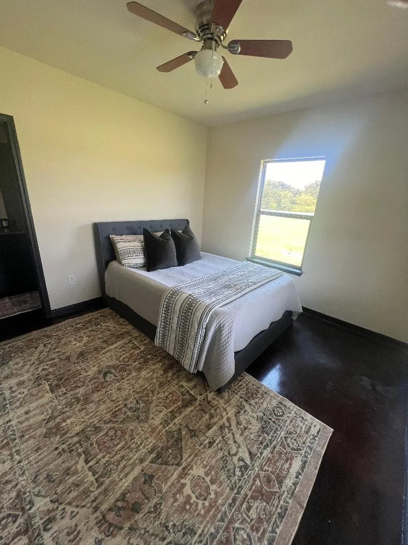 Bedroom with a ceiling fan