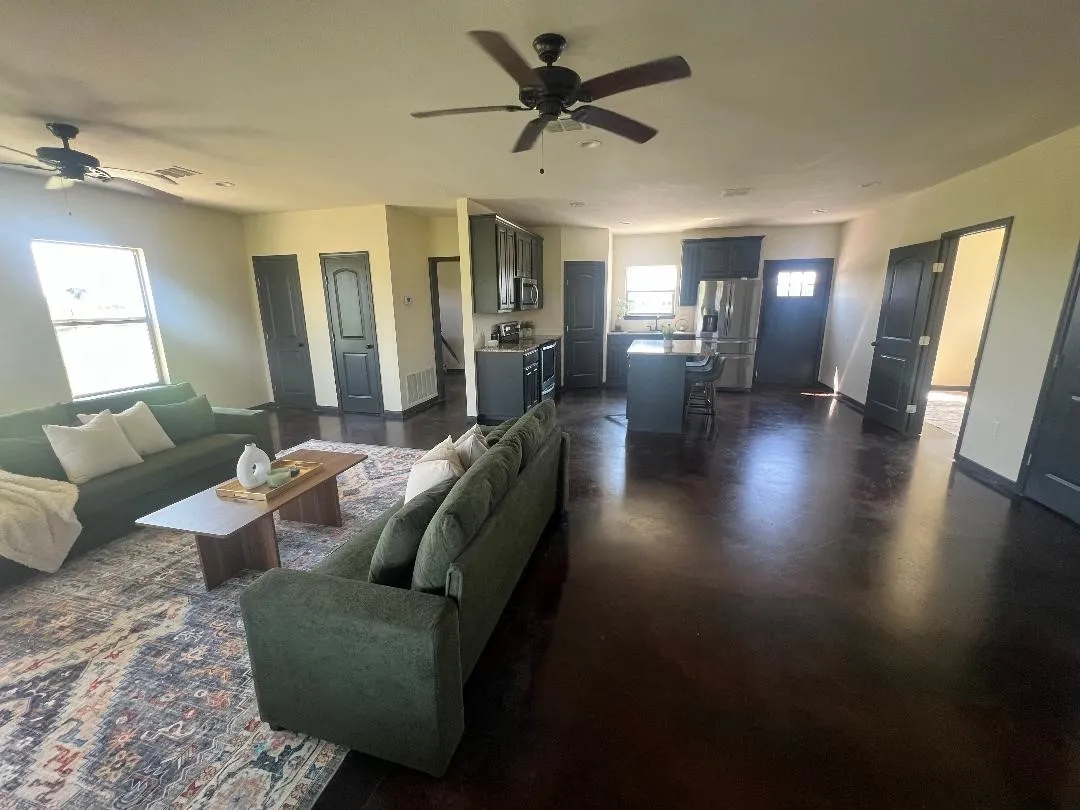 Living area  and concrete flooring