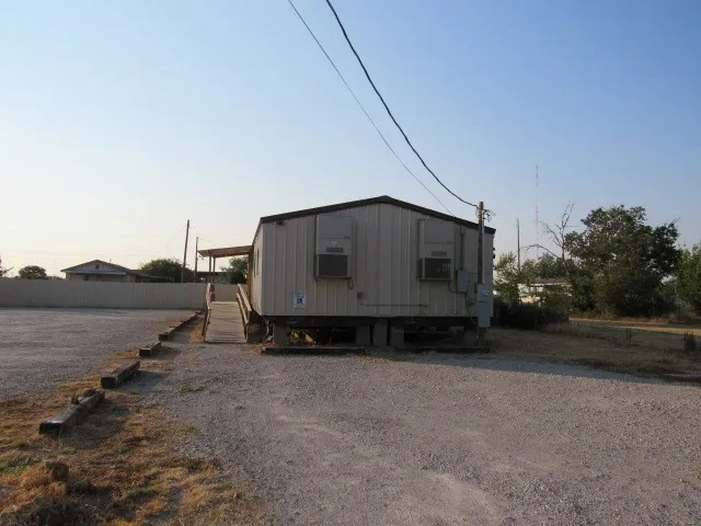 End of building with 2 HVAC systems.