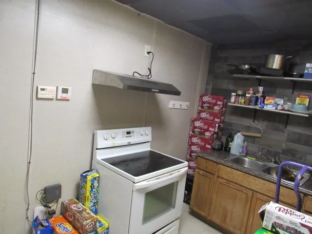 Workroom and kitchen area.