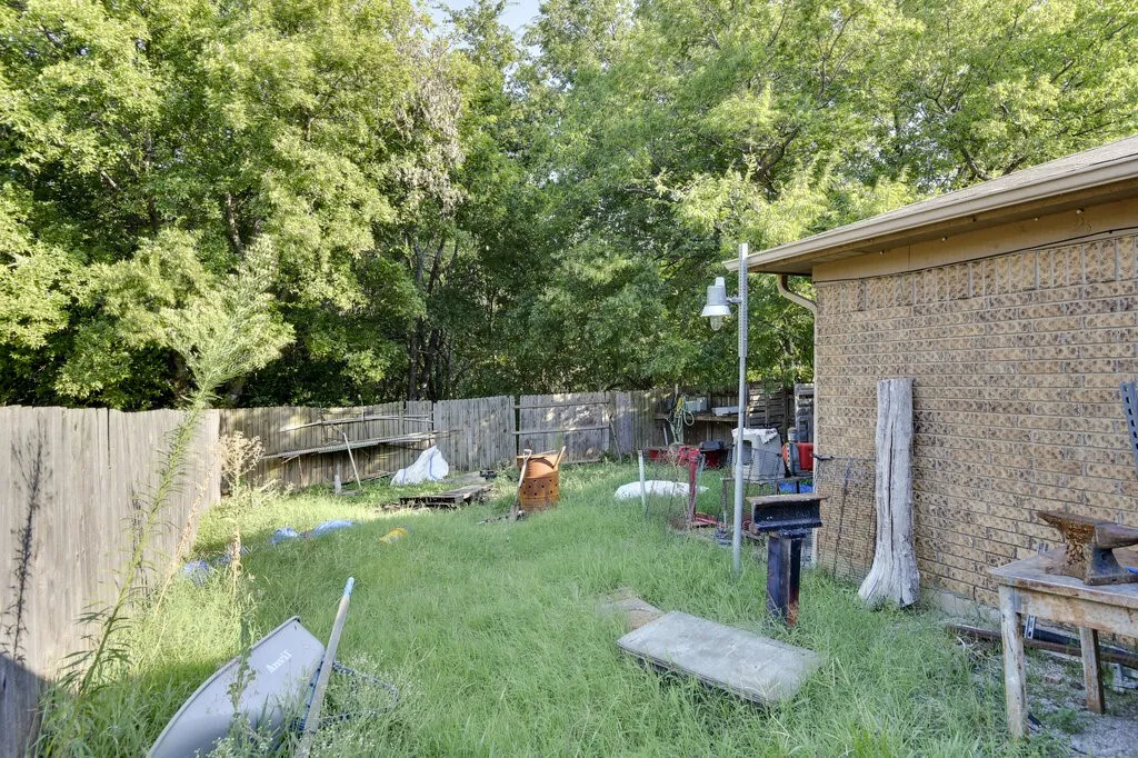 Left Unit Fenced backyard with a patio area