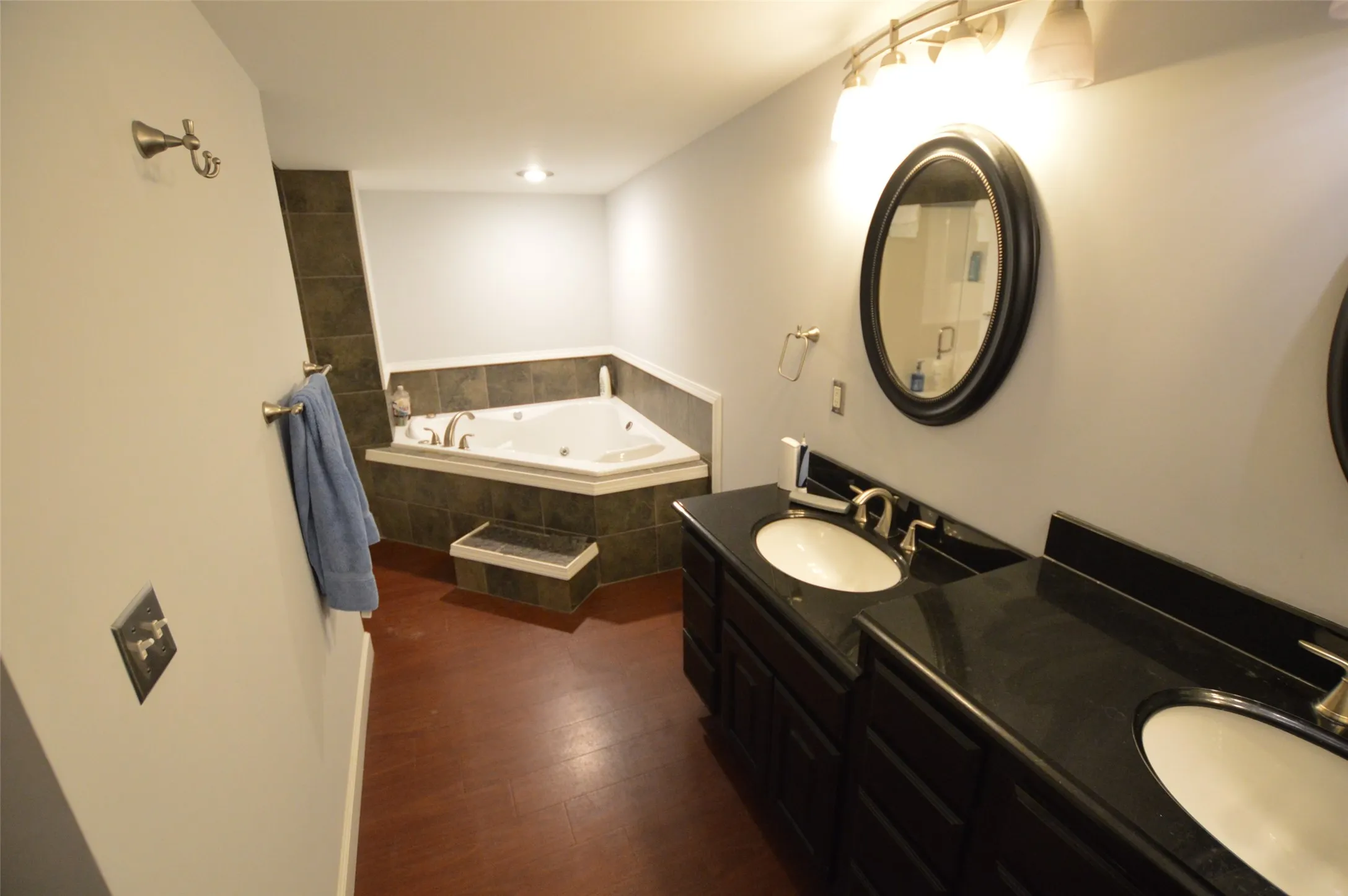 Double sink and Garden tub in primary bathroom