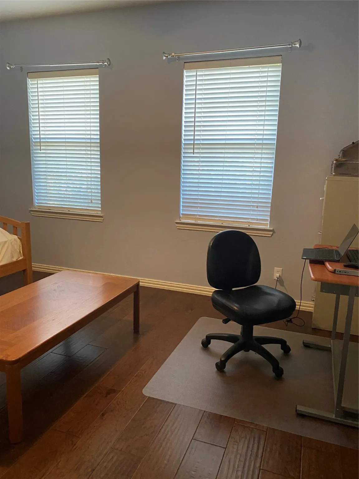 Office area with wood finished floors
