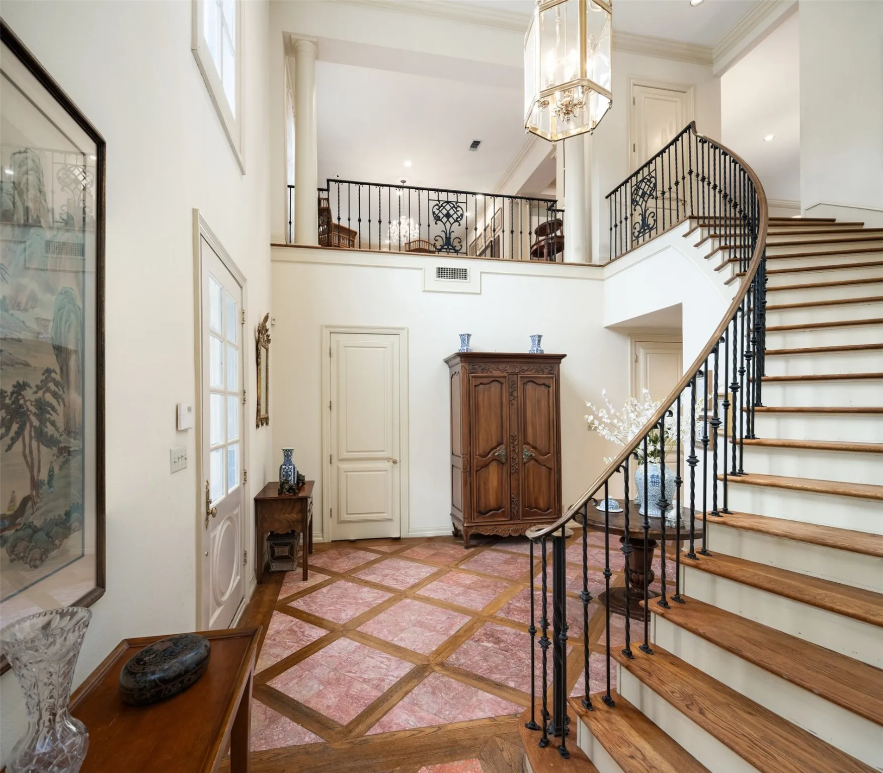 Elegant Foyer entrance leading up to the third level.