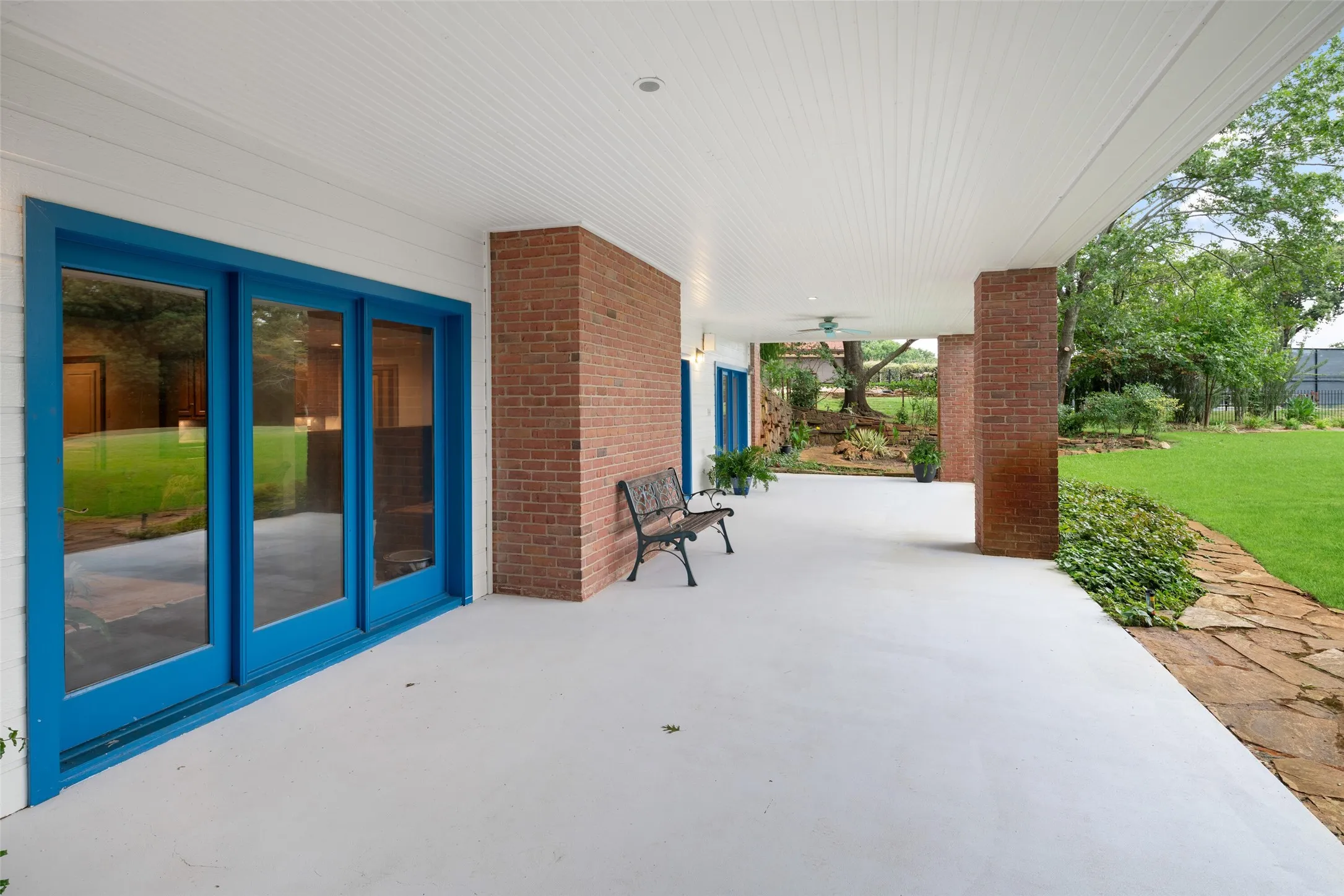 View of covered patio on the ground level.