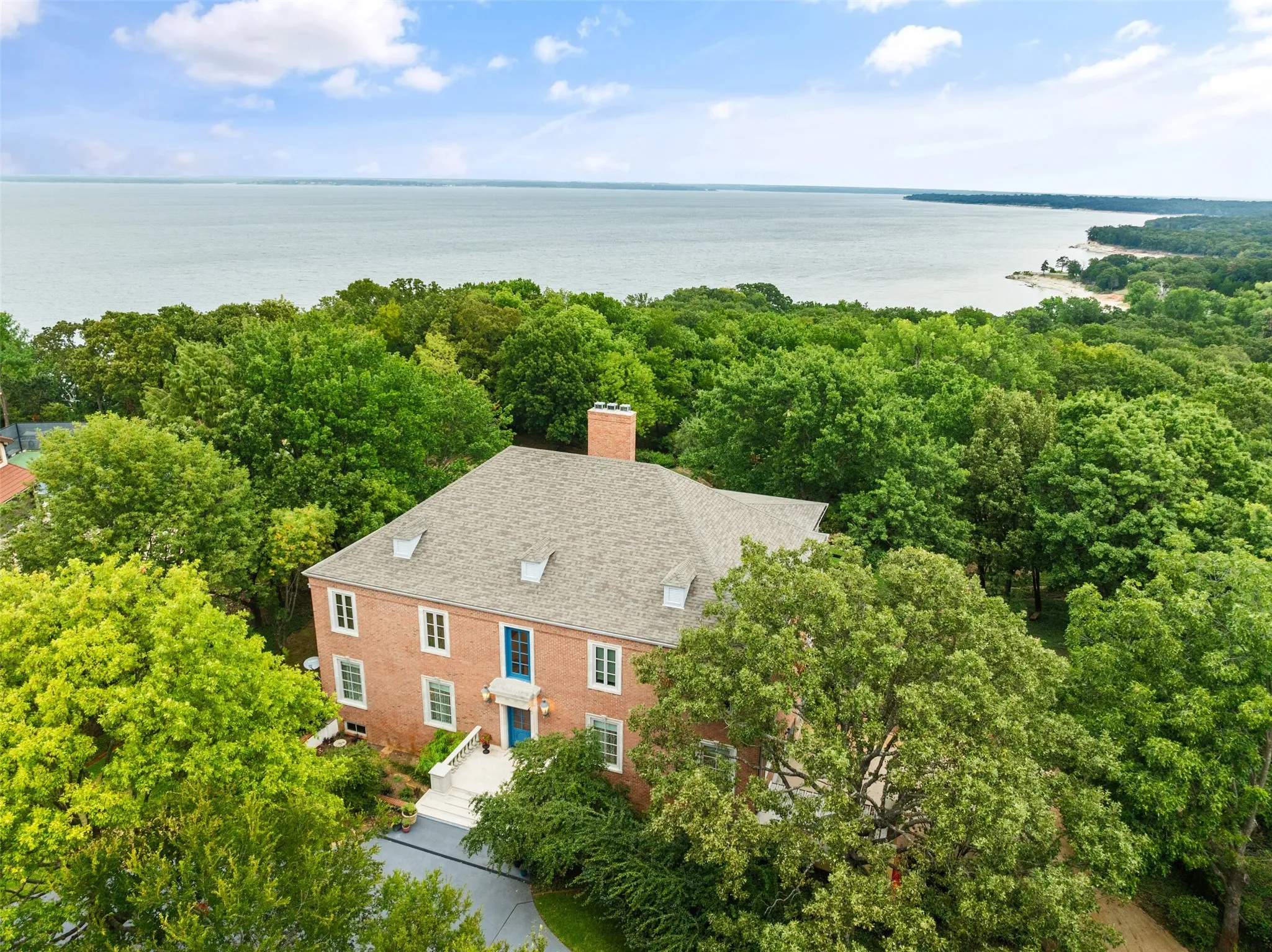 View of subject property featuring a nearby body of water