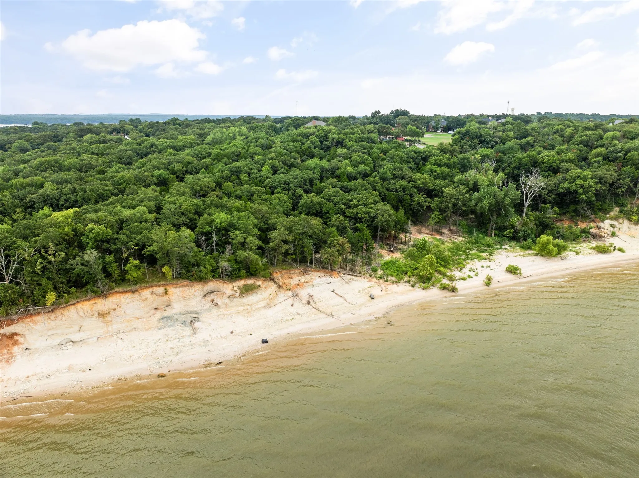 Bird's eye view of of the sandy beach on lake Texoma.
