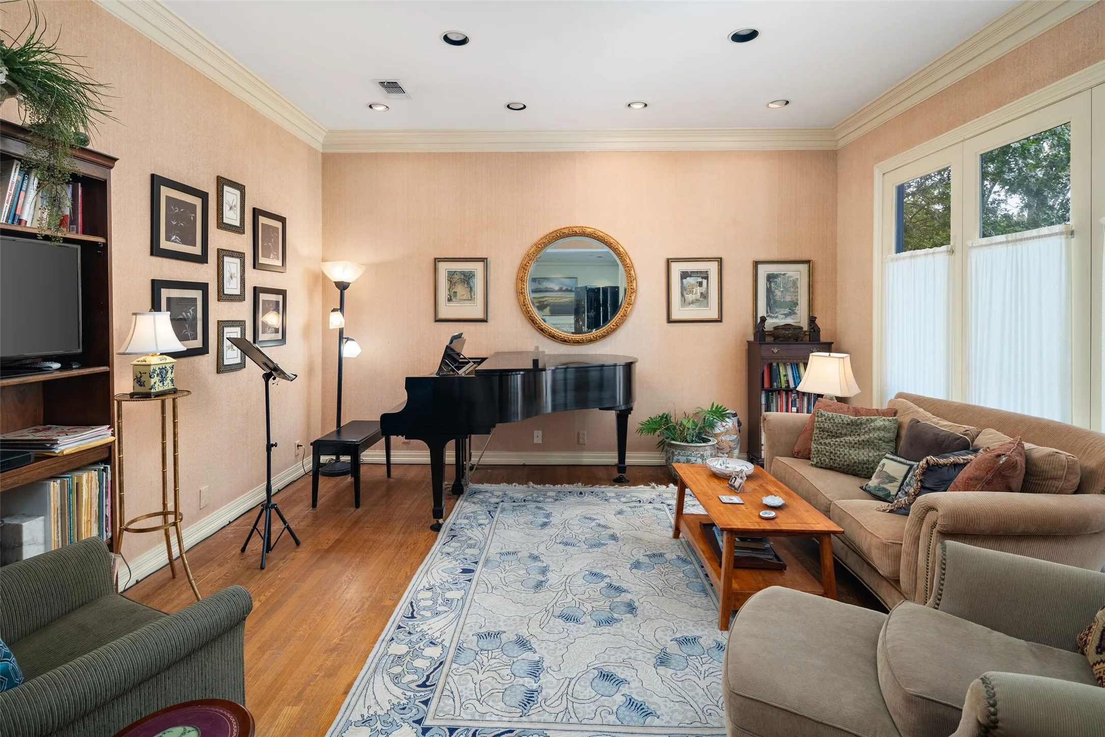 A piano room or could be used as another TV room or office on the second level with a private balcony.