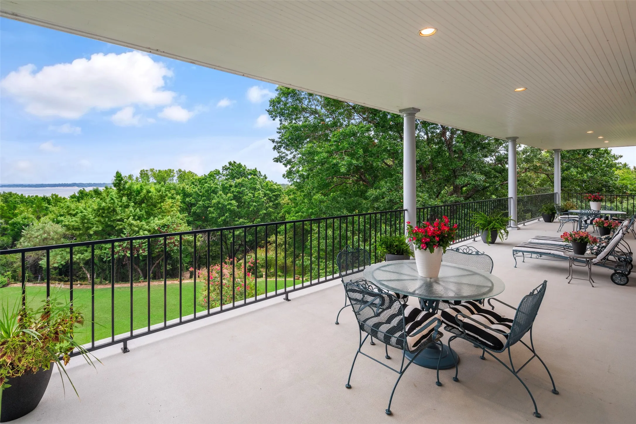 Large balcony with plenty of room to entertain and a stunning view of lake.