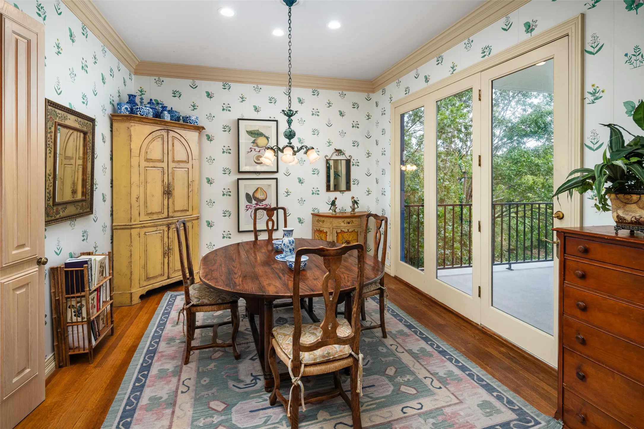 A breakfast area with a private balcony and view of the lake located on the third level.