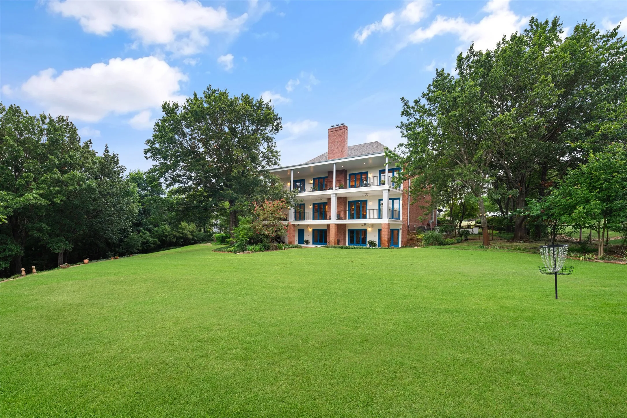 View of the back of house and landscaping.