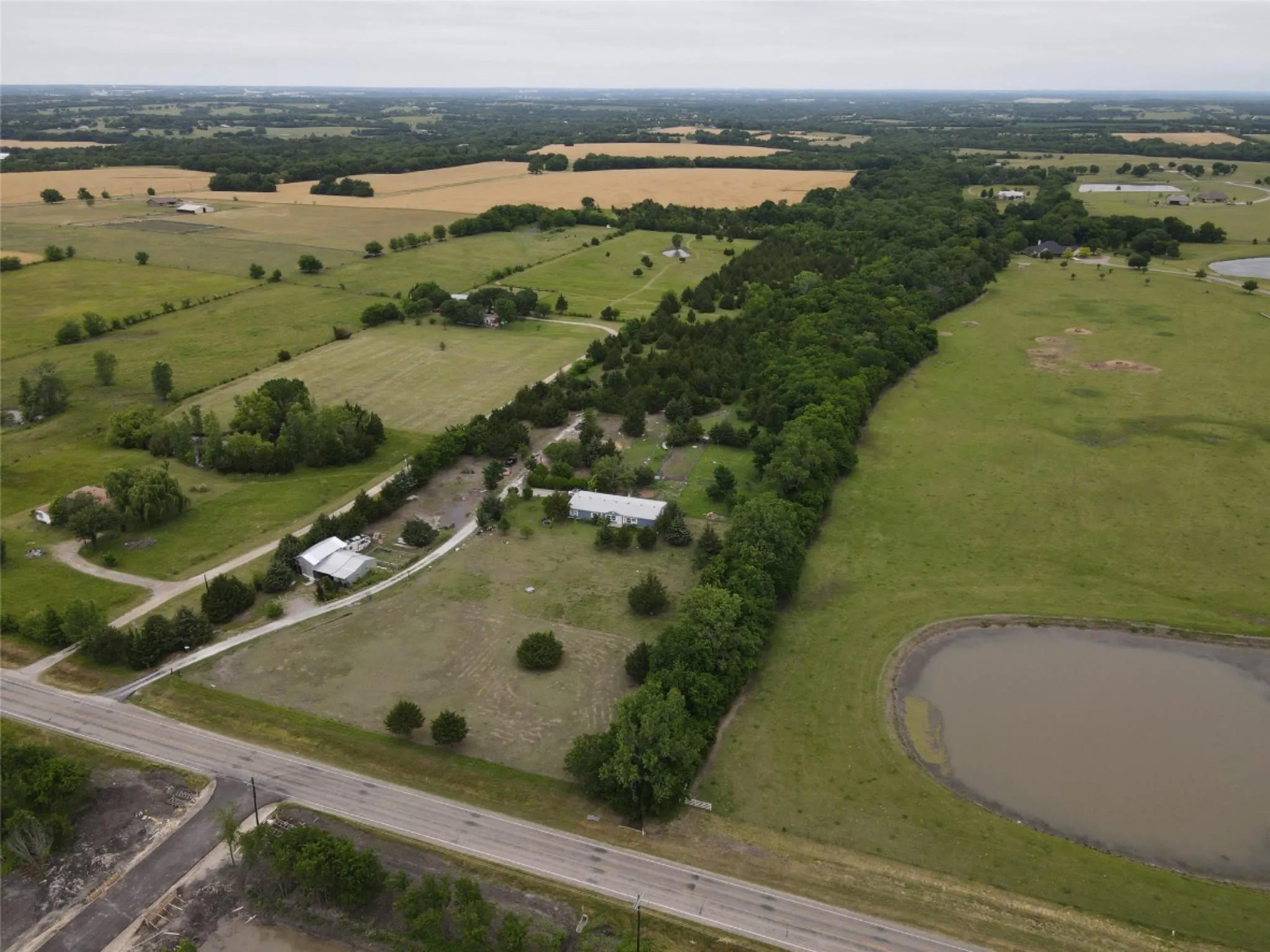 Aerial overview of property's location with rural landscape