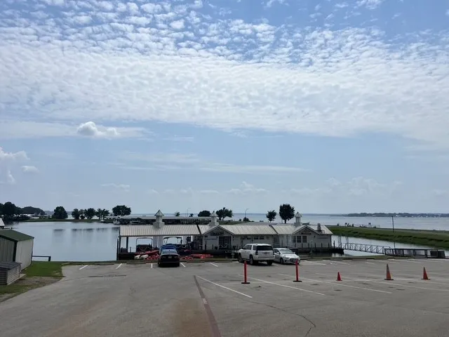 Uncovered parking lot with a water view