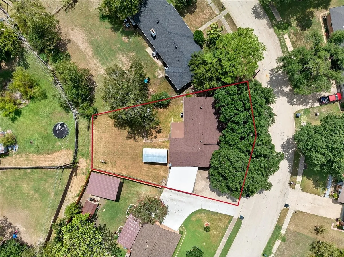 Aerial overview of property's location with property boundaries highlighted