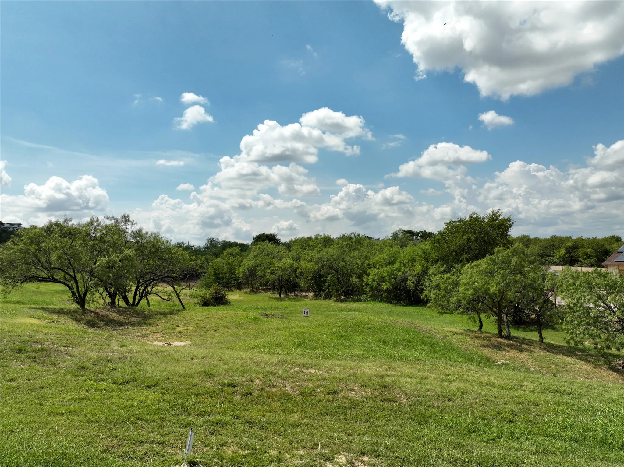 View of grassy yard with a rural view