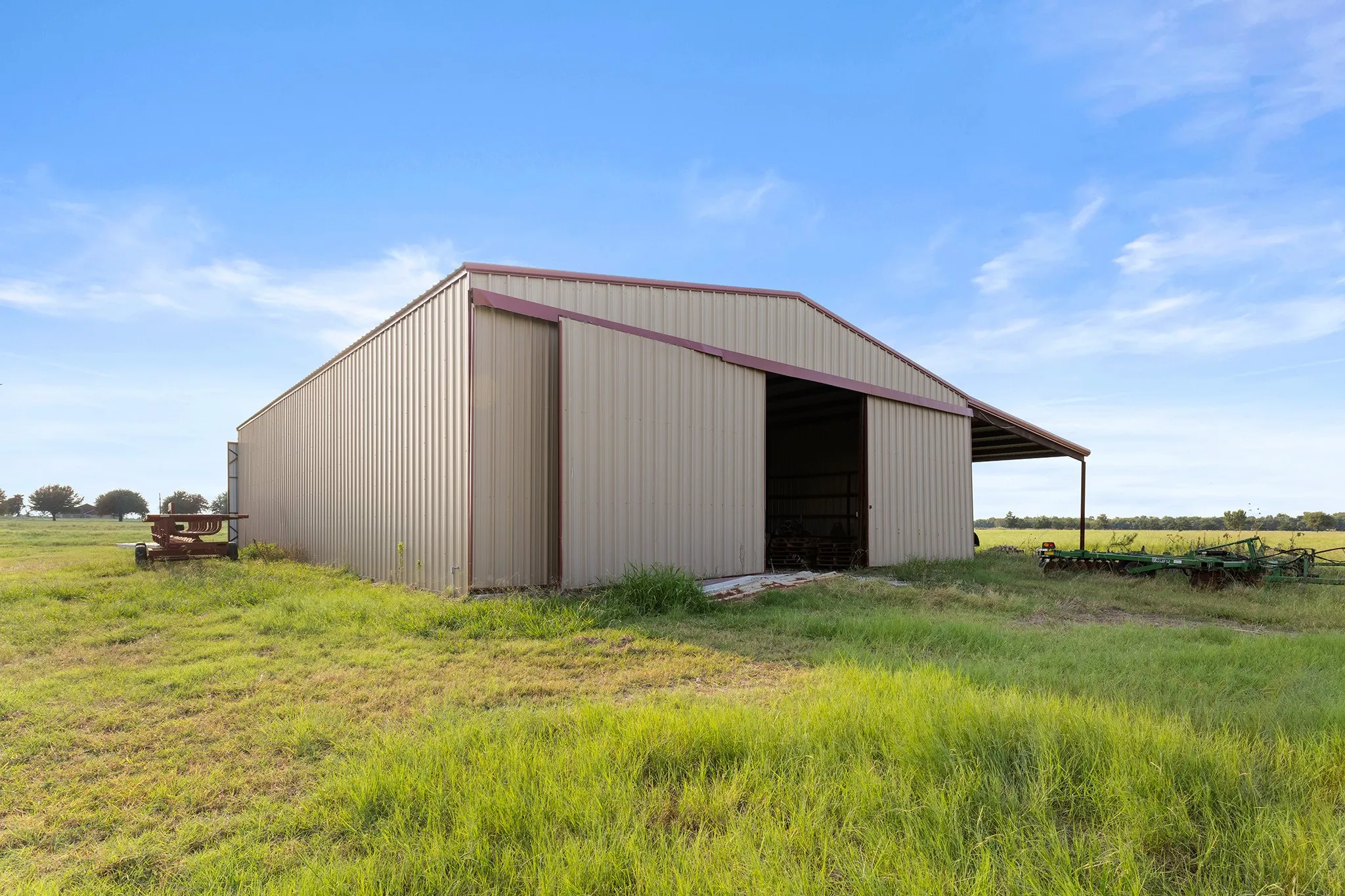 View of pole building with a view of rural / pastoral area