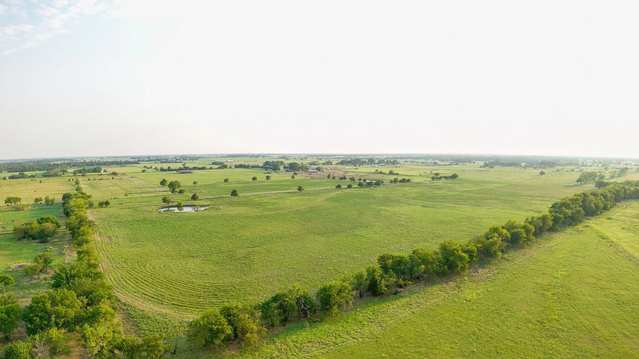 Overview of rural landscape with a large body of water